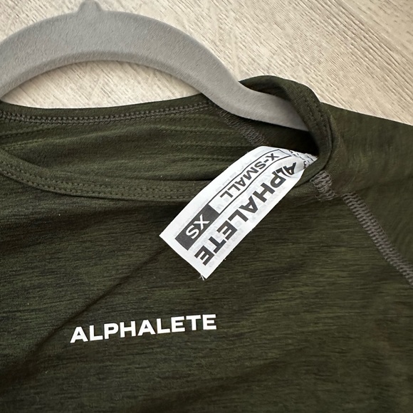 Alphalete Amplify Crop Top in Evergreen - Picture 2 of 4
